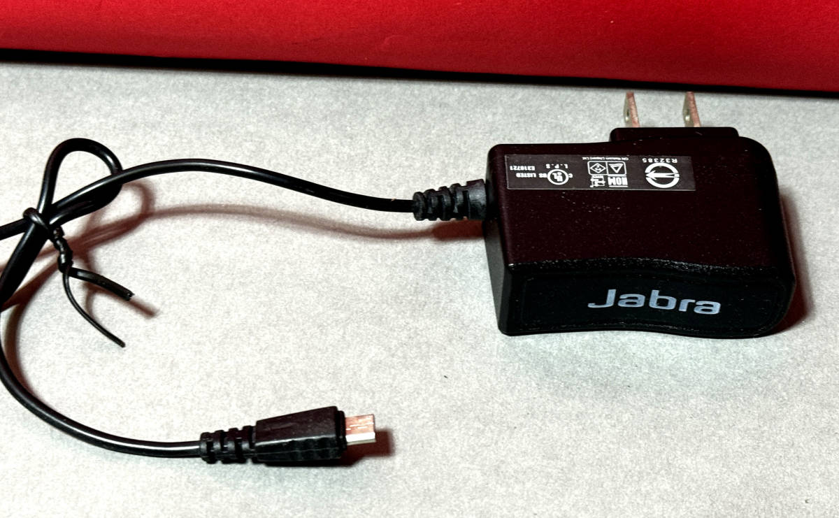 *.jabra AC adapter IN/AC100-240V 50/60Hz 0.2A