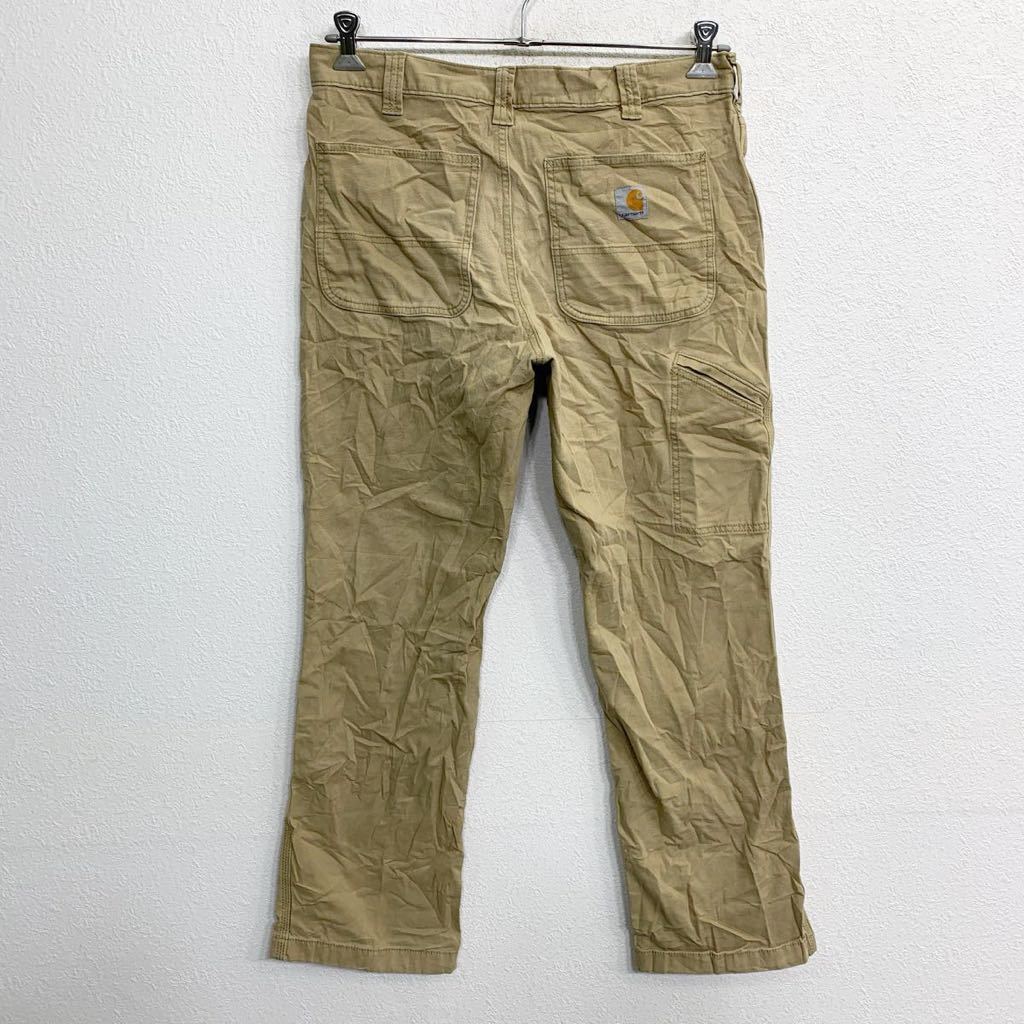 中古 古着 Carhartt ワークパンツ W33 カーハート リラックスフィット ペインターパンツ ベージュ 古着卸 アメリカ仕入 2401-528_画像4