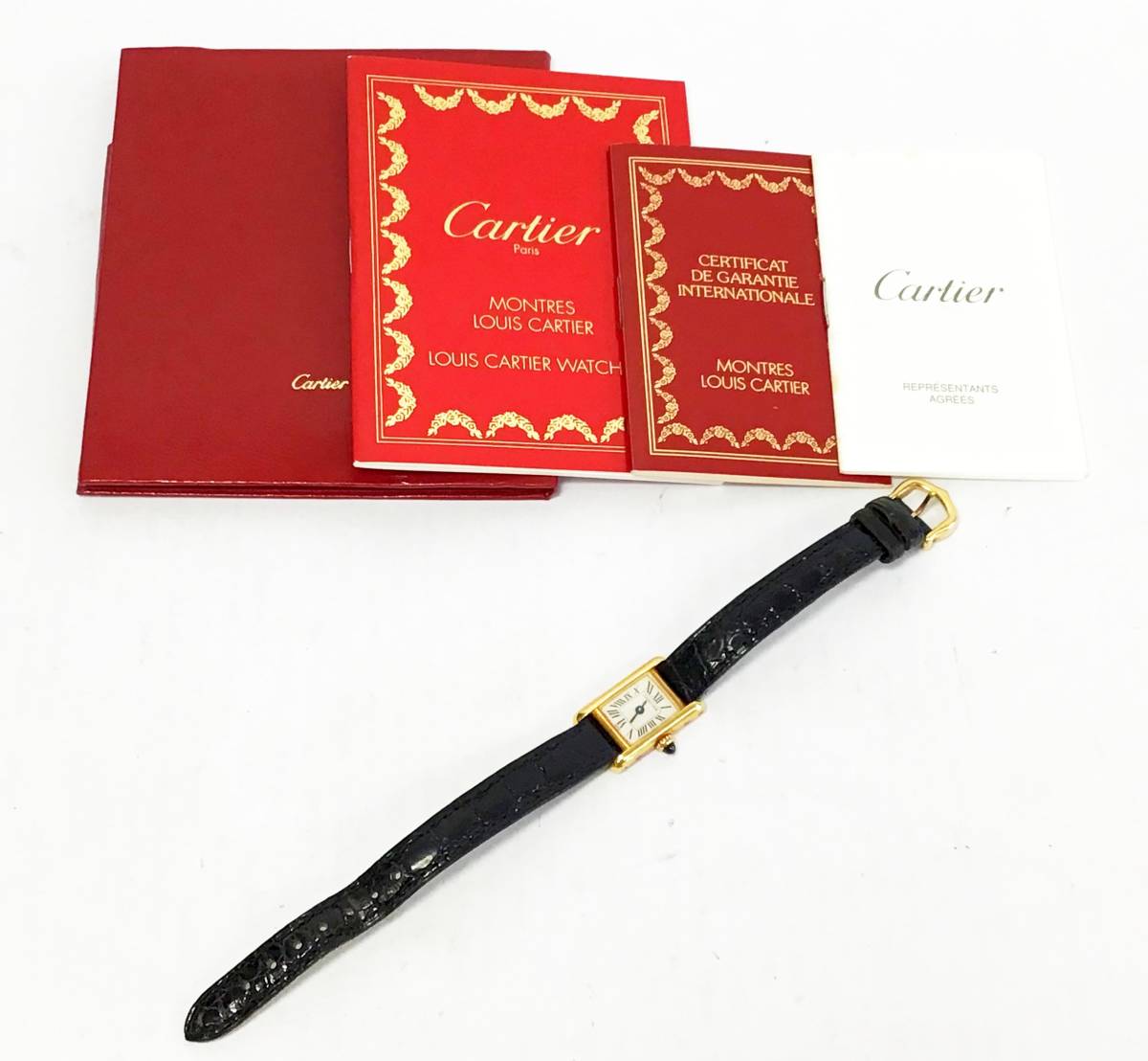 動作品 Cartier 腕時計 ミニタンク 1360 クォーツ 18K 18金 イエローゴールド 白文字盤 2針 黒ベルト レディース カルティエ の画像1