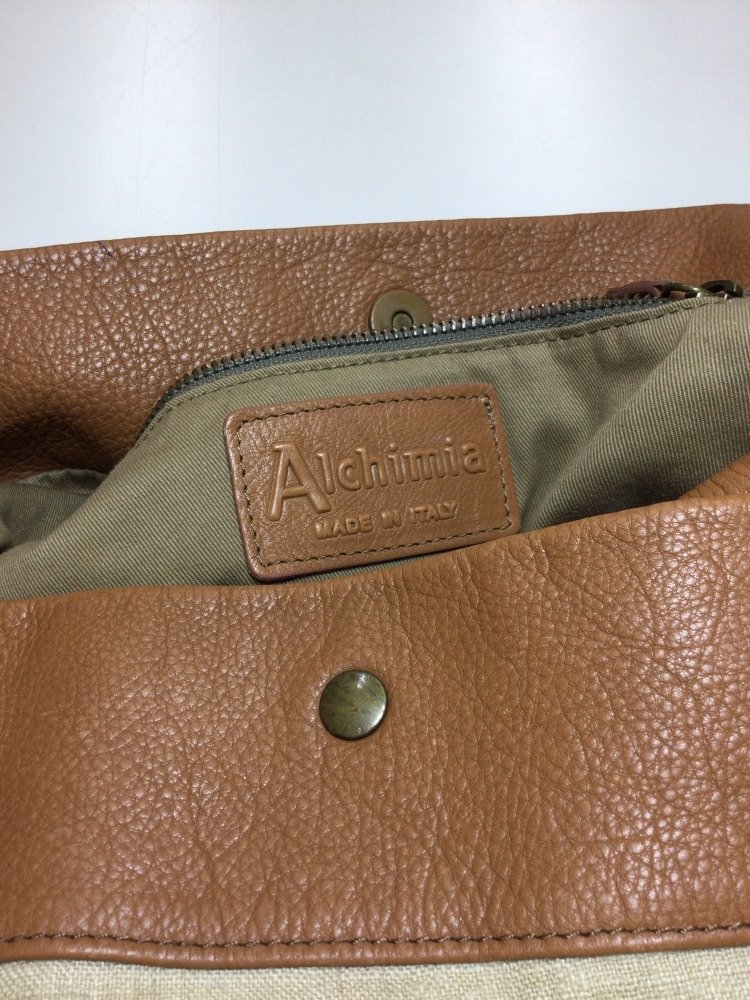 ALCHIMIAaru Kimi a beige cloth . Camel color leather combination bag 