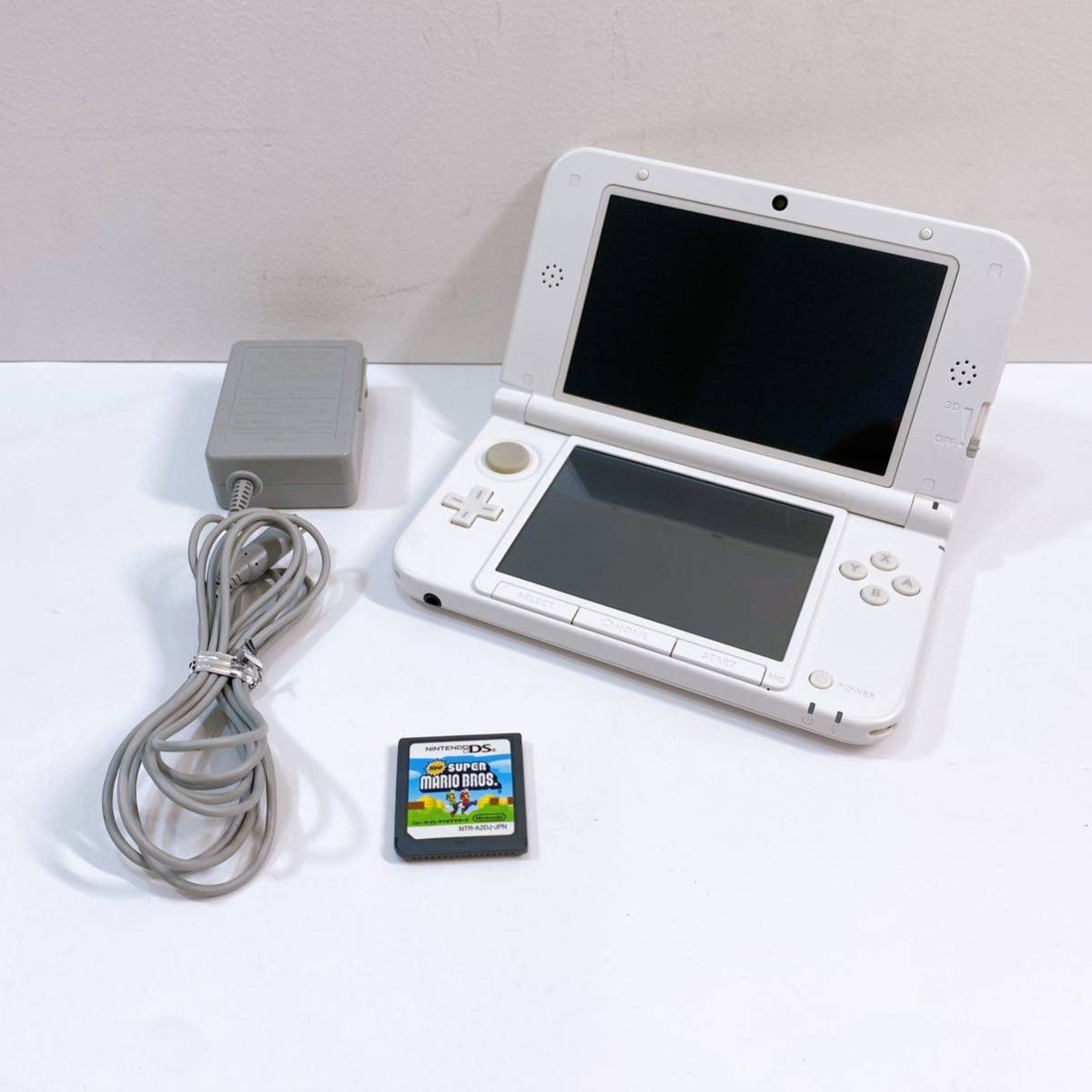 317☆中古☆ Nintendo 3DS LL ホワイト SPR-001 ソフト 充電器 タッチペン付き ニンテンドー 任天堂 初期化済み 動作確認済み 現状品_画像1