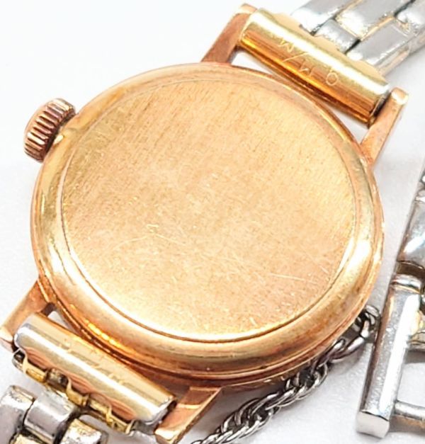 H328-W11-350◎OMEGA オメガ Geneve ジュネーヴ ゴールド レディース腕時計 カットガラス 手巻き 2針 ゴールド文字盤 稼働④_画像5