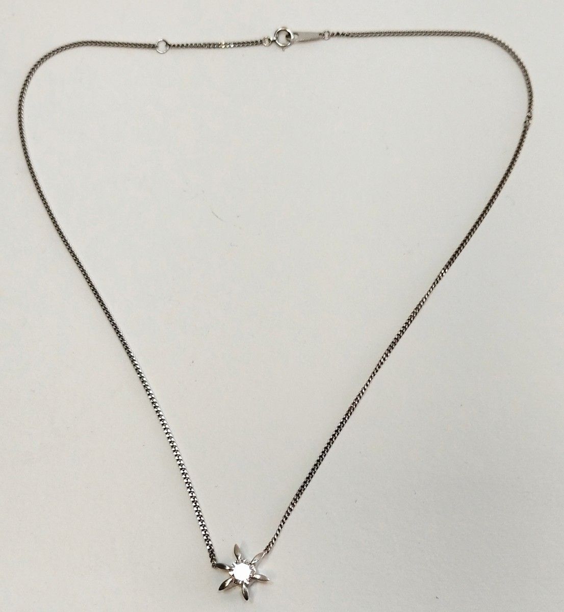 ルミアミのお部屋からの中古のダイヤのPTネックレス 刻印は0597 ペンダントPt900 チェーンPt850 総重量は6.4g
