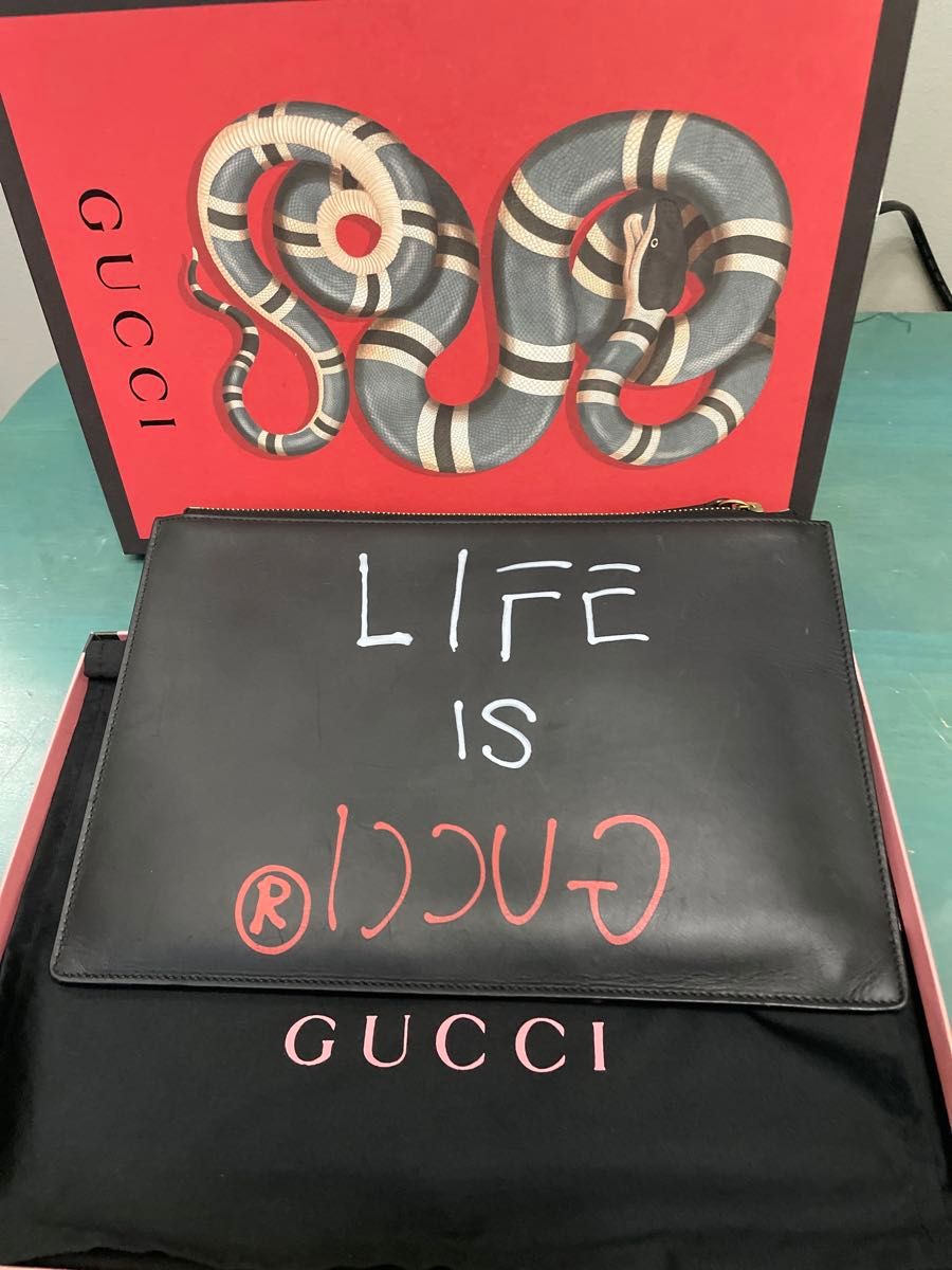 GUCCI クラッチバック　LIFE IS GUCCI  鑑定済みの正規品