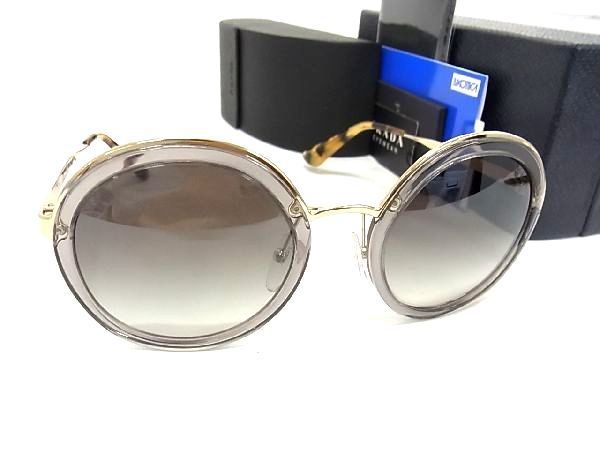 1円 ■極美品■ PRADA プラダ SPR 50T 54□23 BRU-4S1 140 2N サングラス メガネ 眼鏡 レディース メンズ グレー系 AU5780_画像1