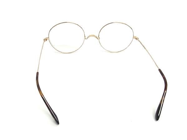 1円 ■極美品■ Oliver Goldsmith オリバー ゴールドスミス 52□21-148 度入り めがね 眼鏡 メガネ レディース メンズ ゴールド系 AS8584_画像2