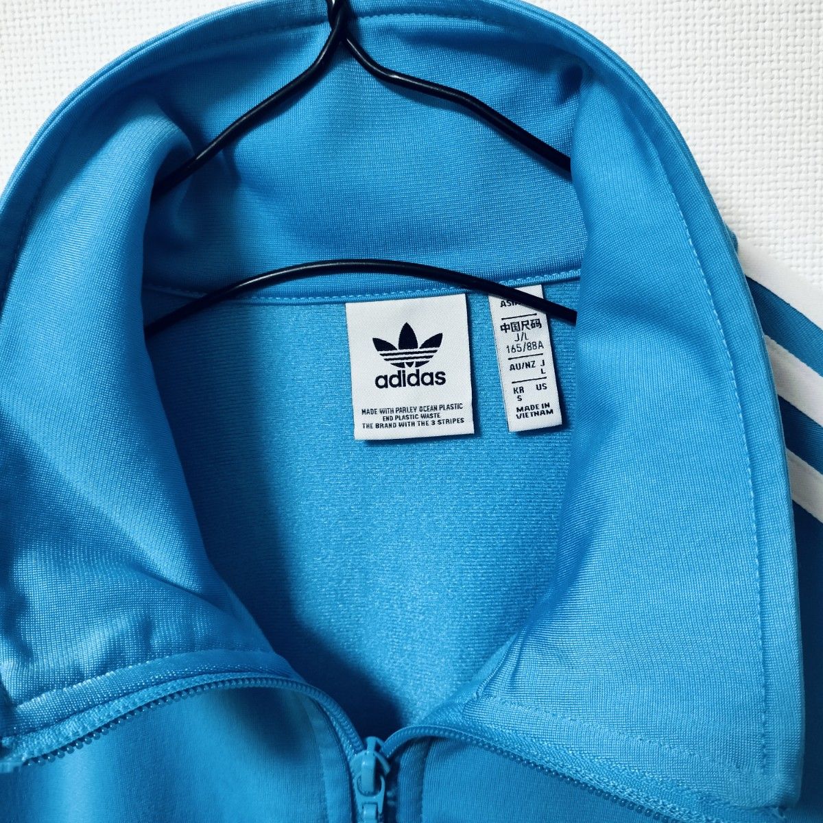 adidas 青 ファイヤーバード 襟高 トラックトップ ジャージ 女性 adidas 青 ファイヤーバード 襟高 トラックトップ ジャージ 女性