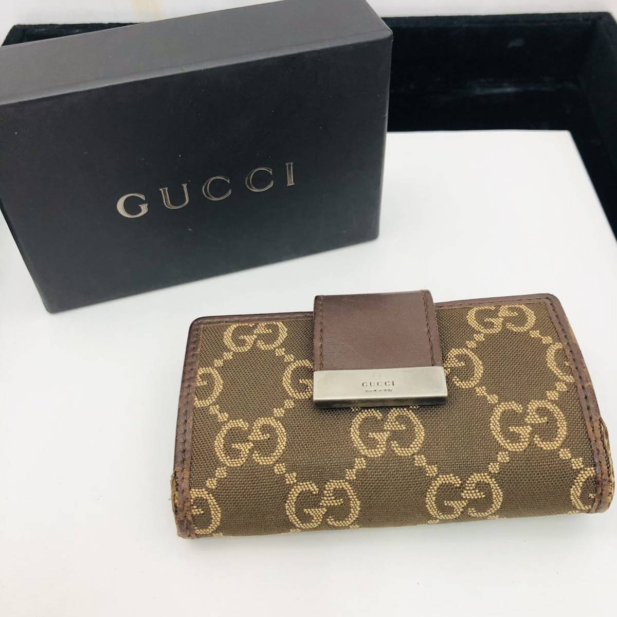 1SA89 グッチ GUCCI ６連キーケース GGキャンバス 茶 GGロゴ 箱付き 中古 現状品_画像1