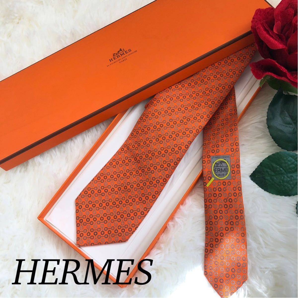 HERMES エルメス メンズ 男性 紳士 ブランドネクタイ ネクタイ ビジネス 総柄 結婚式 お祝い パーティー 素敵 オレンジ 橙 剣先 7.5cm_画像1