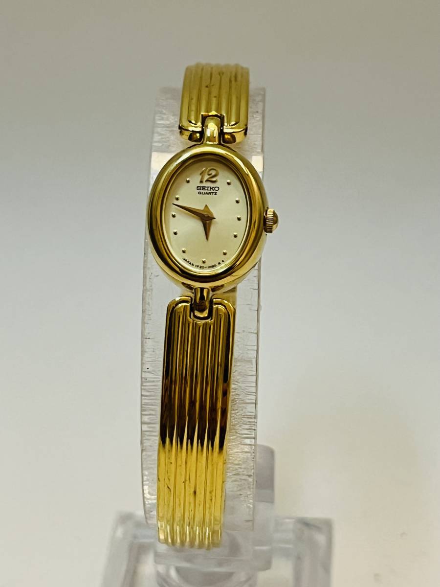 動作未確認　SEIKO セイコー ゴールド 文字盤 SS レディース 腕時計1F20-5H50 クオーツ バングル_画像1