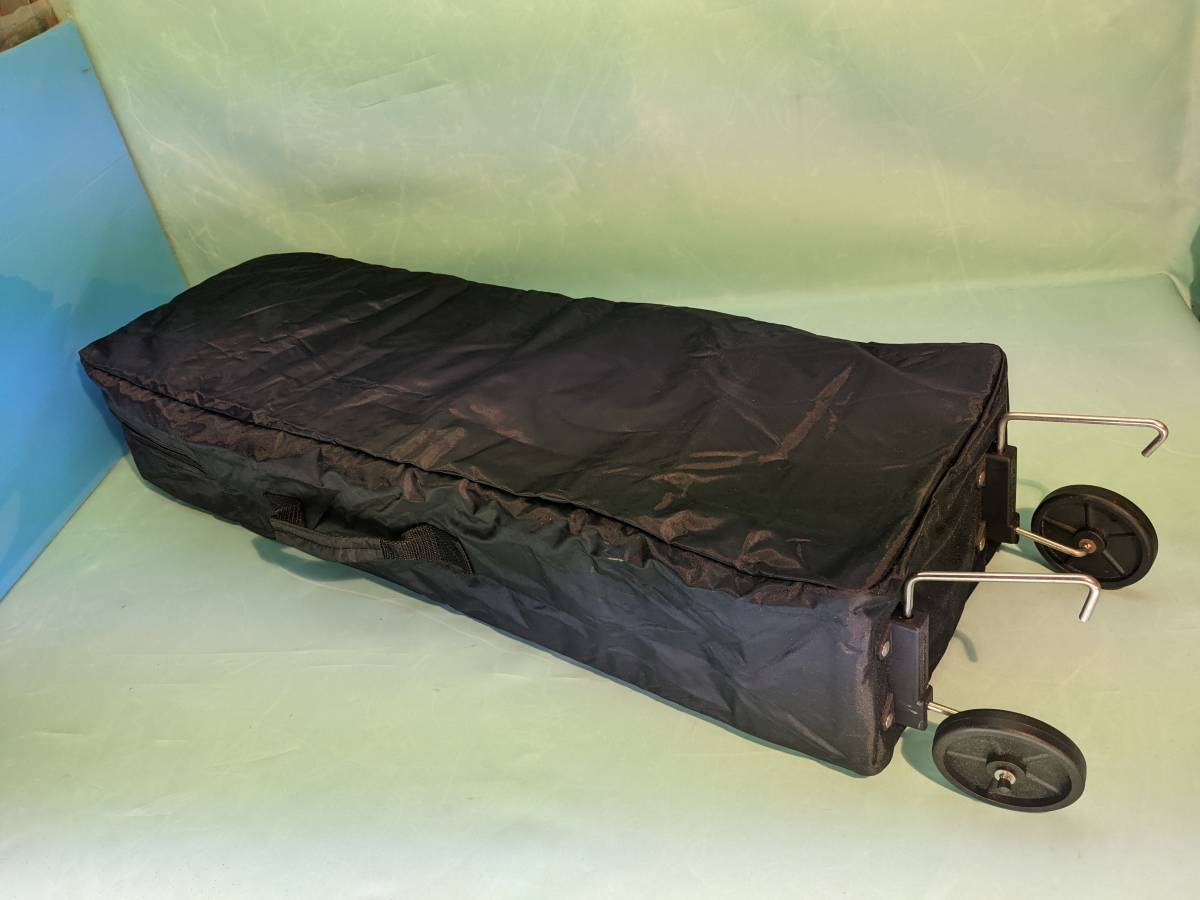 T15 Okinawa sanshin case storage cover ( with casters .)
