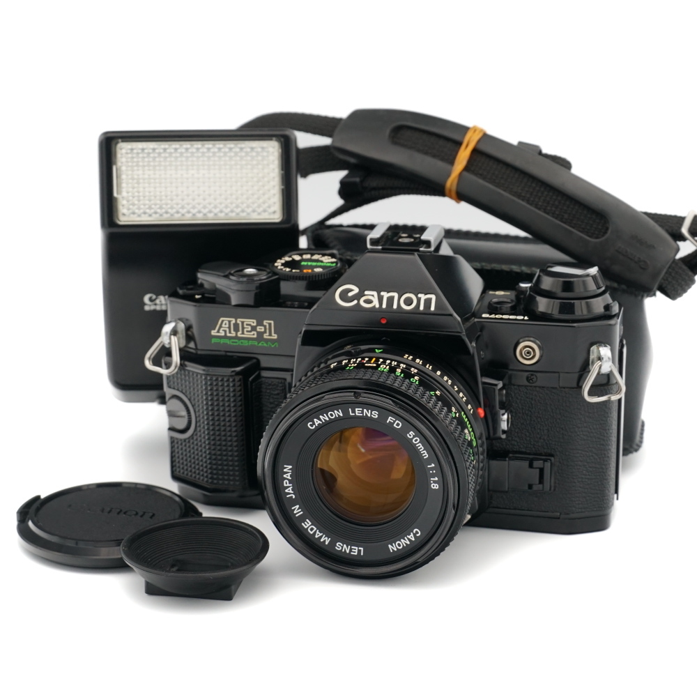 通電シャッターOK 要メンテ Canon AE-1 PROGRAM NEW FD 50mm F1.8 188A ボディ 標準レンズ ストロボ アイカップ_画像1