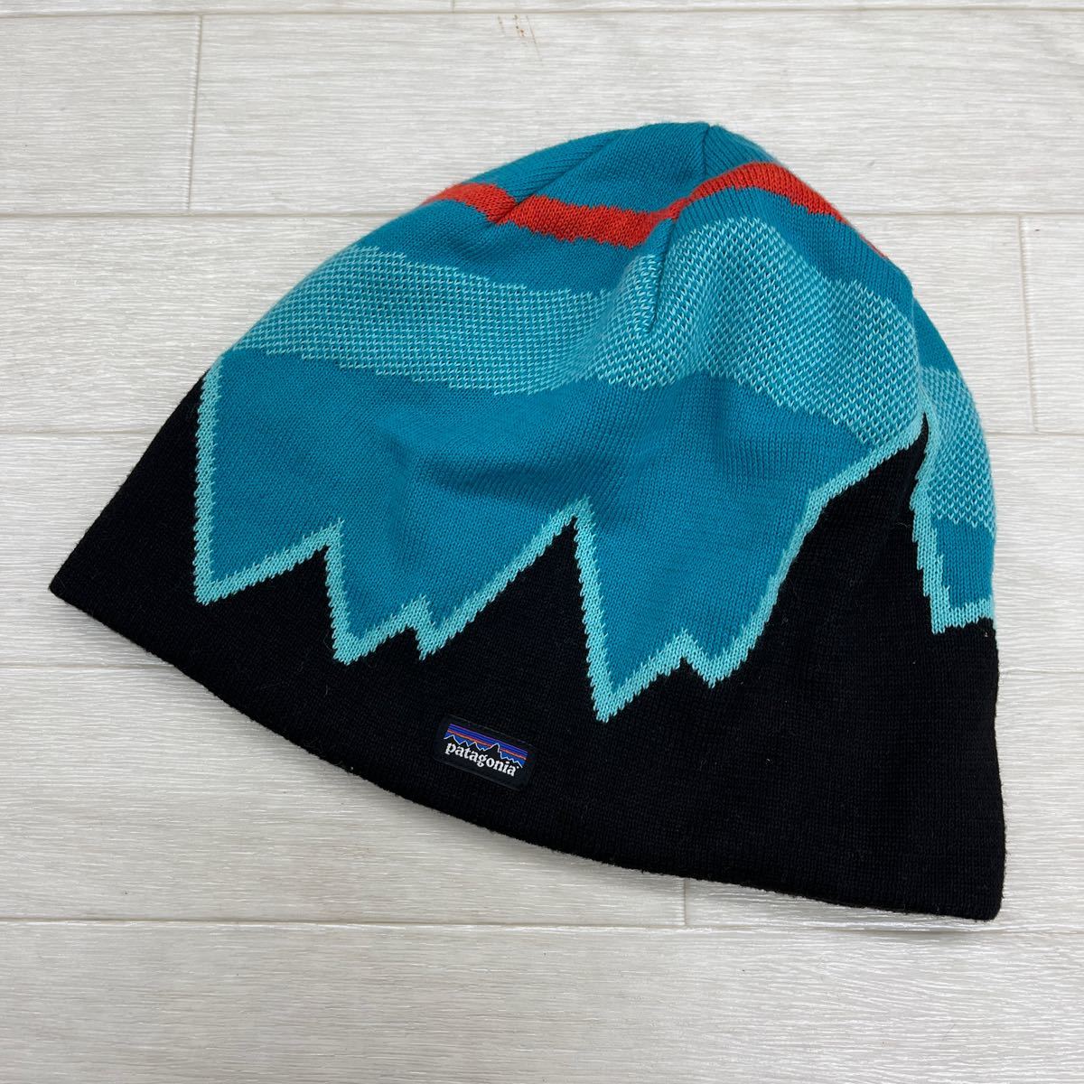 1308◎ patagonia パタゴニア アウトドア 帽子 キャップ ニット帽 カジュアル 総柄 ブラック ブルー メンズALL_画像1