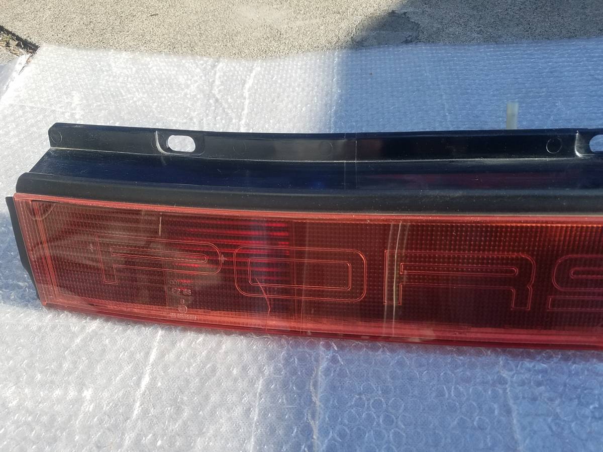 Porsche Porsche 911 Carrera original tail light tail lamp rear light center garnish 394.510 S1745