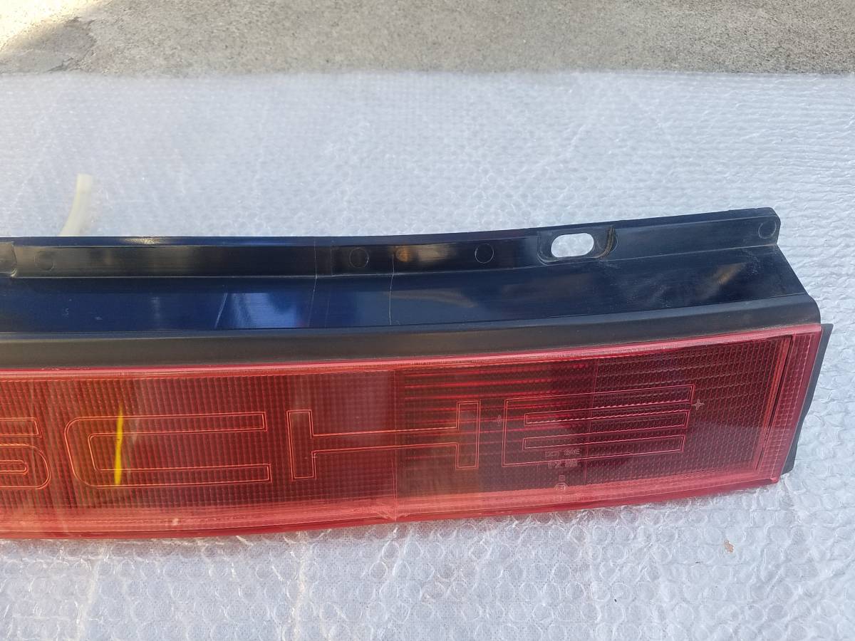 Porsche Porsche 911 Carrera original tail light tail lamp rear light center garnish 394.510 S1745