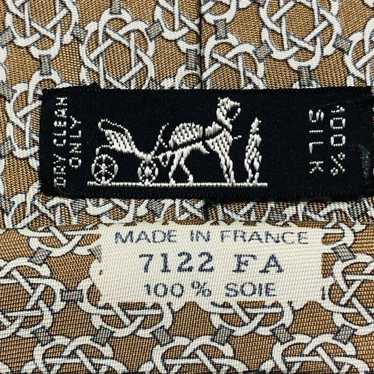 ■美品■HERMES エルメス　ネクタイ　金具　総柄　シルク100% フランス製　ライトブラウン