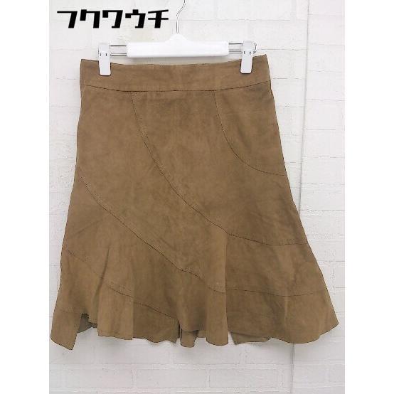 * DKNY Donna Karan New York mountain sheep leather go-tos gold knees height flair skirt size 4 Brown lady's 