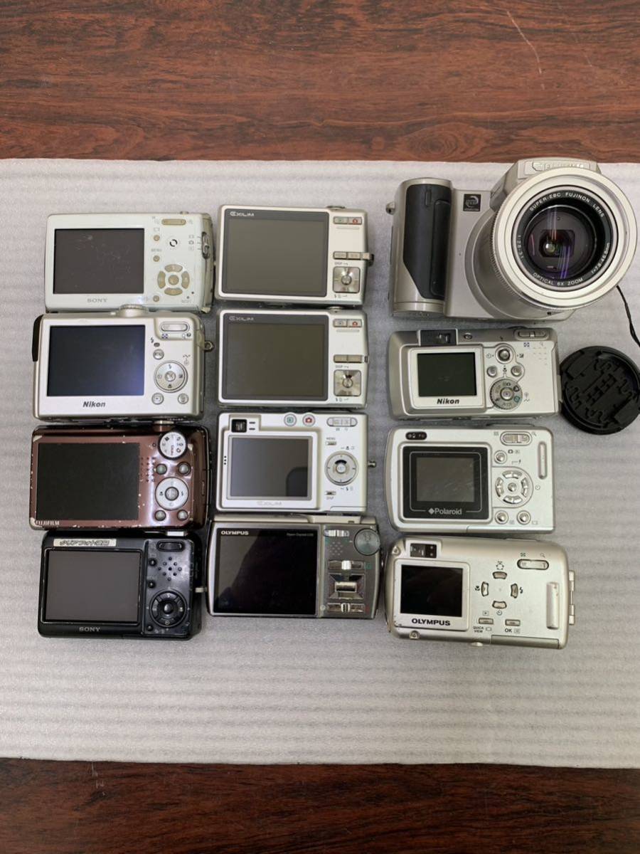 191 デジタルカメラ CASIO OLYMPUS SONY FUJIFILM Nikon 12台 ジャンク品_画像1