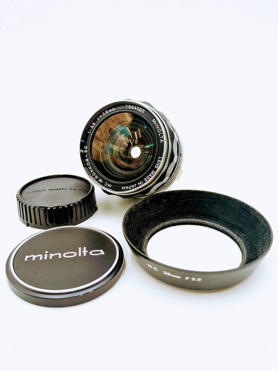 MINOLTA ミノルタ MC W ROKKOR-SG 1:3.5 f=28mm 一眼レフ カメラ レンズ 現状品 メタルフード付き _画像1
