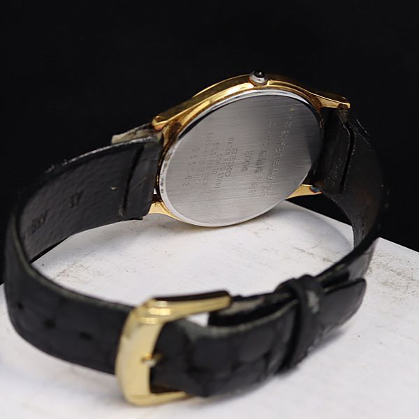 1円 稼働 良品 セイコー ドルチェ QZ 8J41-6100 ゴールド文字盤 NSK メンズ腕時計 OGH 2000000_画像4