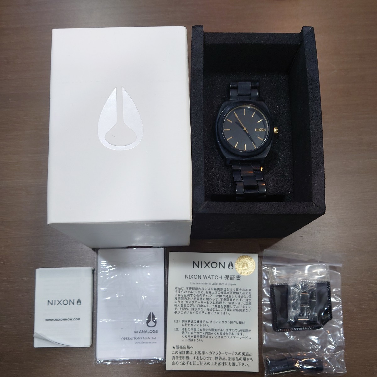 T★1円〜中古品 電池交換済 Nixon ニクソン 黒 クォーツ 腕時計 MORE IS MORE THE TIME TELLER ACETATE 動作品 コマ付き_画像1