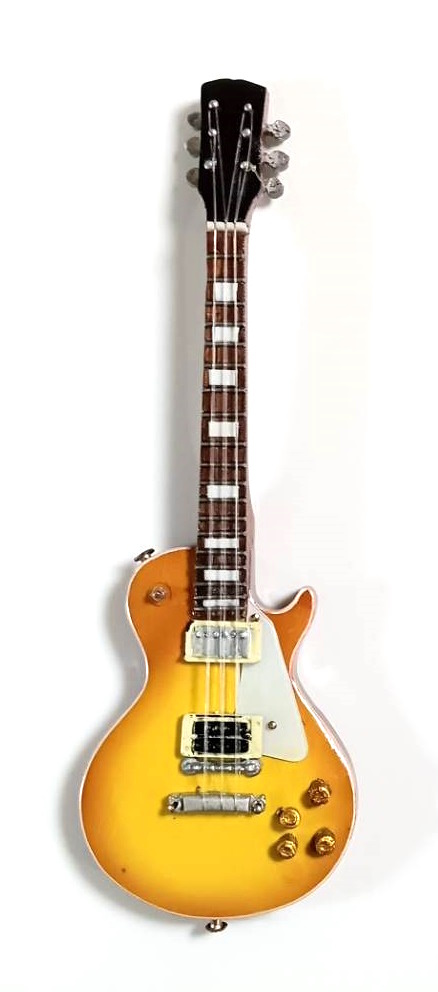 Slashモデルミニチュアギター黄15 cm。ミニ楽器の画像1