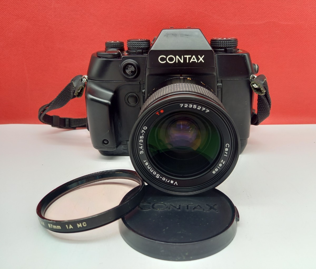 ■ CONTAX AX ボディ 一眼レフ フィルムカメラ Carl Zeiss Vario-Sonnar 3.4/35-70 T* レンズ 動作確認済 シャッターOK コンタックス