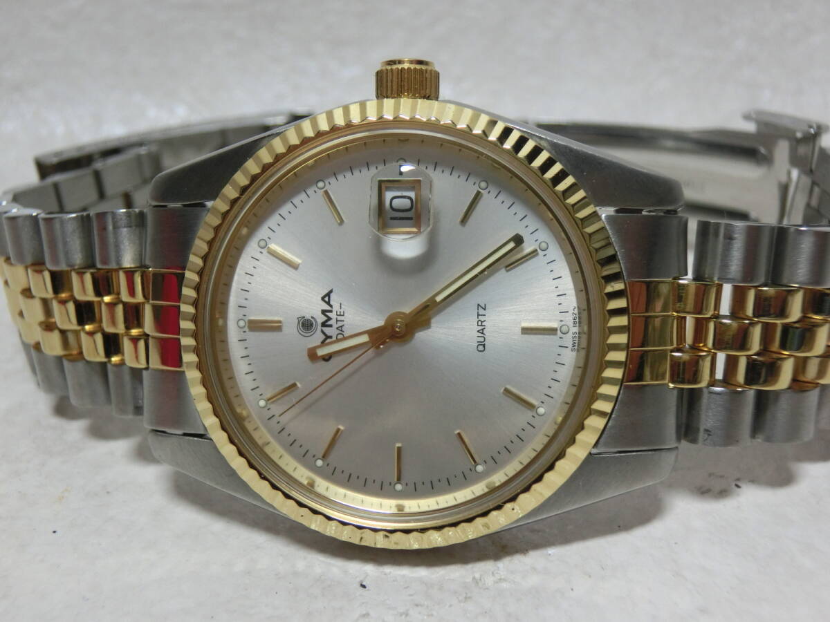 【№1041-O6004】中古品：  CYMA シーマ  ラウンド コンビ クォーツ メンズ腕時計  比較的きれいな商品の画像2