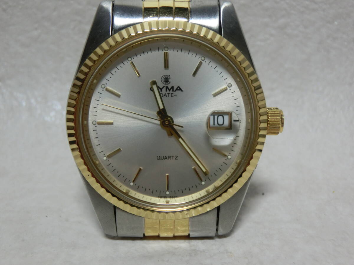 【№1041-O6004】中古品：  CYMA シーマ  ラウンド コンビ クォーツ メンズ腕時計  比較的きれいな商品の画像1