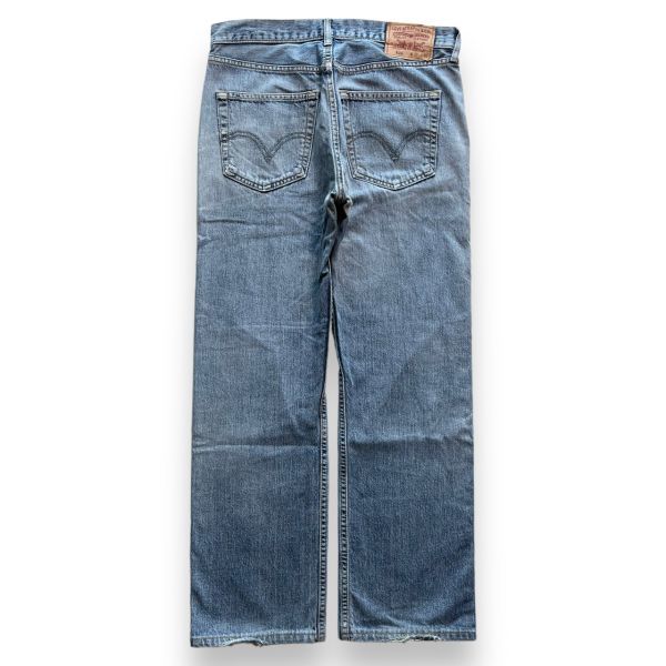 00s Levi's リーバイス 521 テーパード デニム パンツ 00521-0042 ジーンズ ジーパン ボトム アメカジ 古着 W33 L32 ライトブルー_画像1