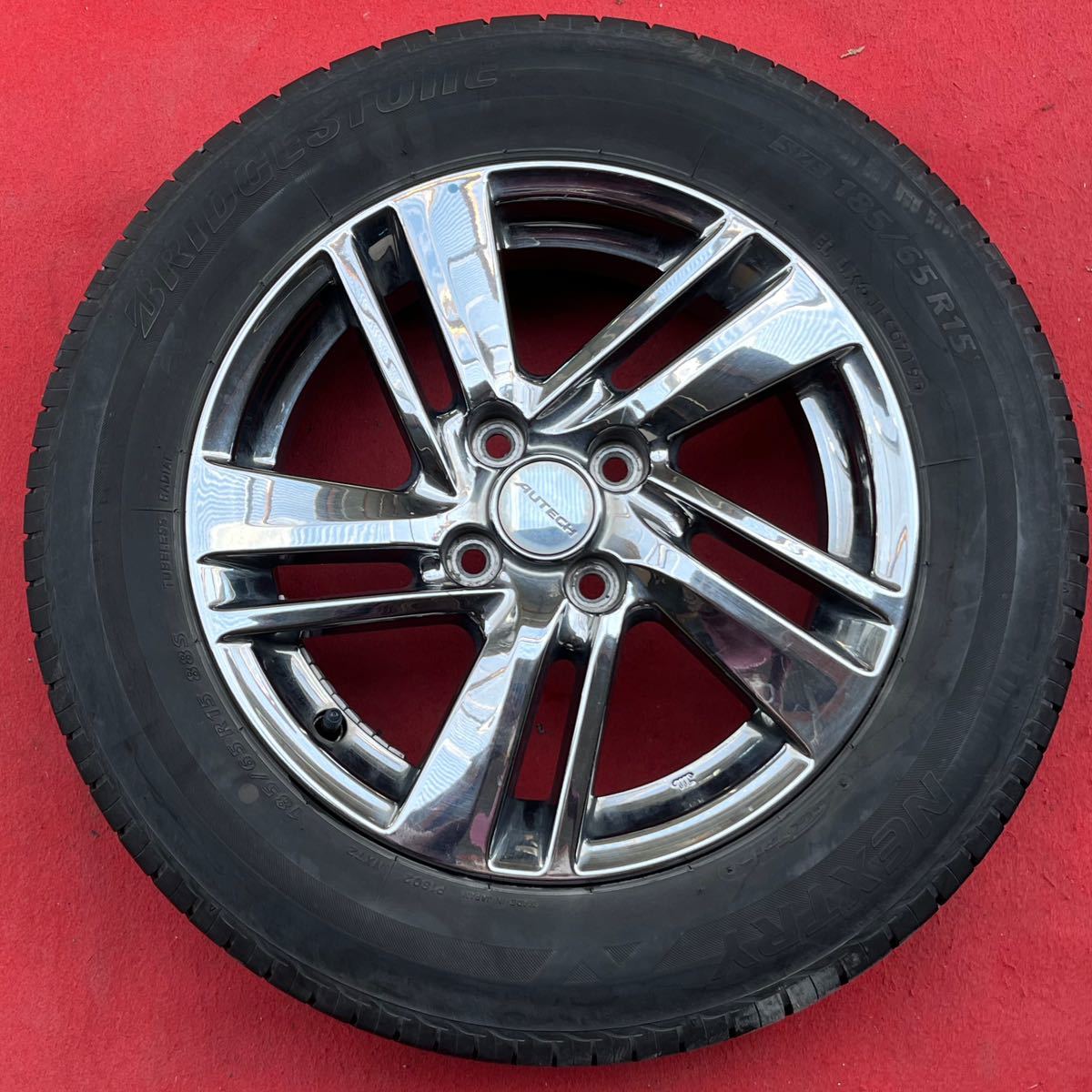 ENKEI製。AUTECH オーテックNISSAN 日産純正 15インチ×5.5J+40 PCD100 4Hメッキ BRIDGESTONE 185/65R15ラジアル4本。E12ノートライダー☆の画像5