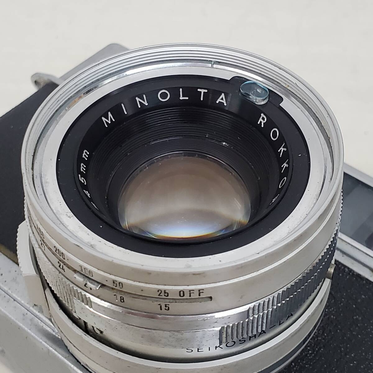 0228-207* Minolta MINOLTA high matic HI-MATIC 7 film camera range finder ROKKOR-PF 1:1.8 f=45. operation not yet verification Junk 