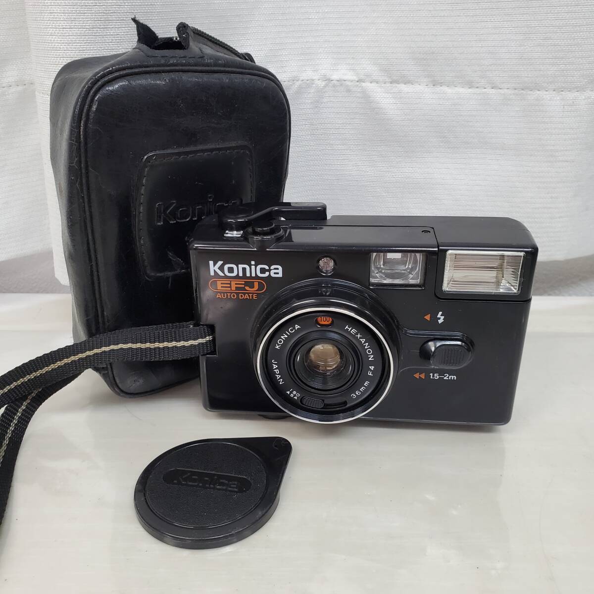 0228-218□コニカ KONICA フィルムカメラ EFJ AUTO DATE HEXANON F4 36㎜ ケース付 動作未確認 ジャンク ※簡易梱包の画像1