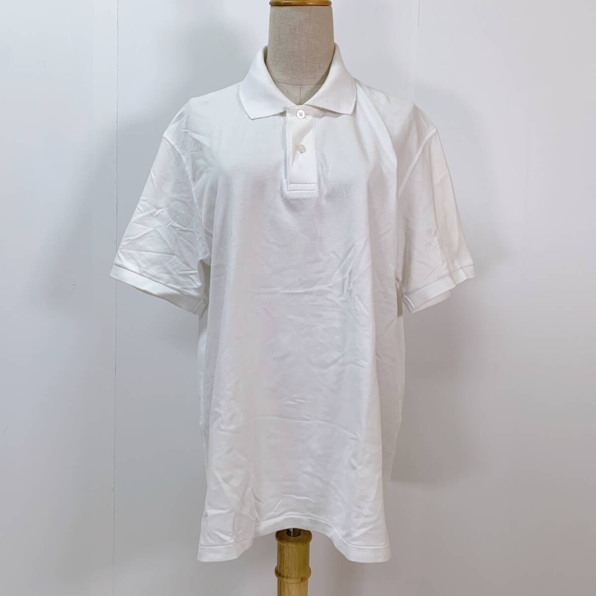 S2685 UNIQLO ユニクロ メンズ ポロシャツ 半袖 人気 XL 白 無地 万能 シンプルデイリーカジュアル サイドスリット_画像1