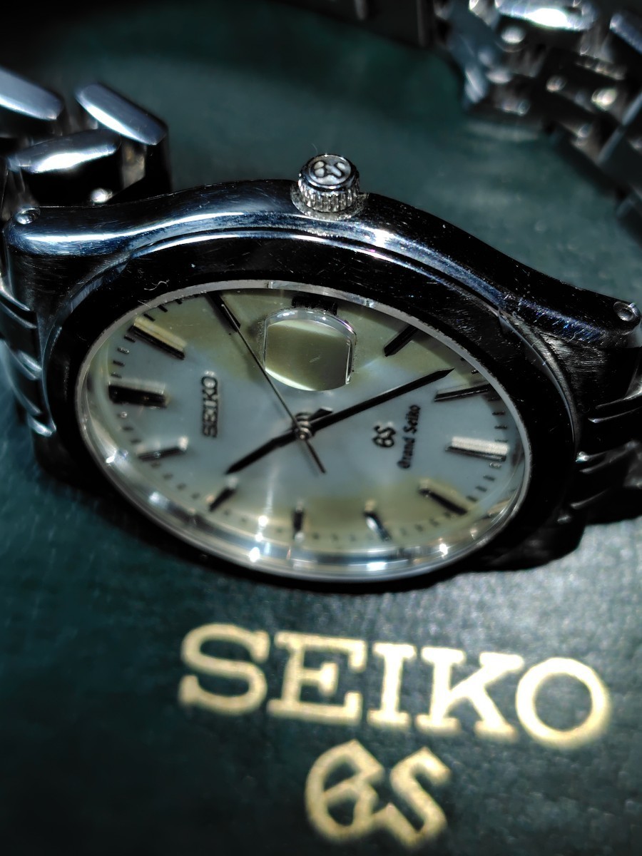 SEIKO セイコー　グランドセイコー　デイト　クオーツ　メンズ腕時計　GRANDSEIKO　純正ブレス　外箱、ケース、取説、コマ付き　299 bx-10_画像9