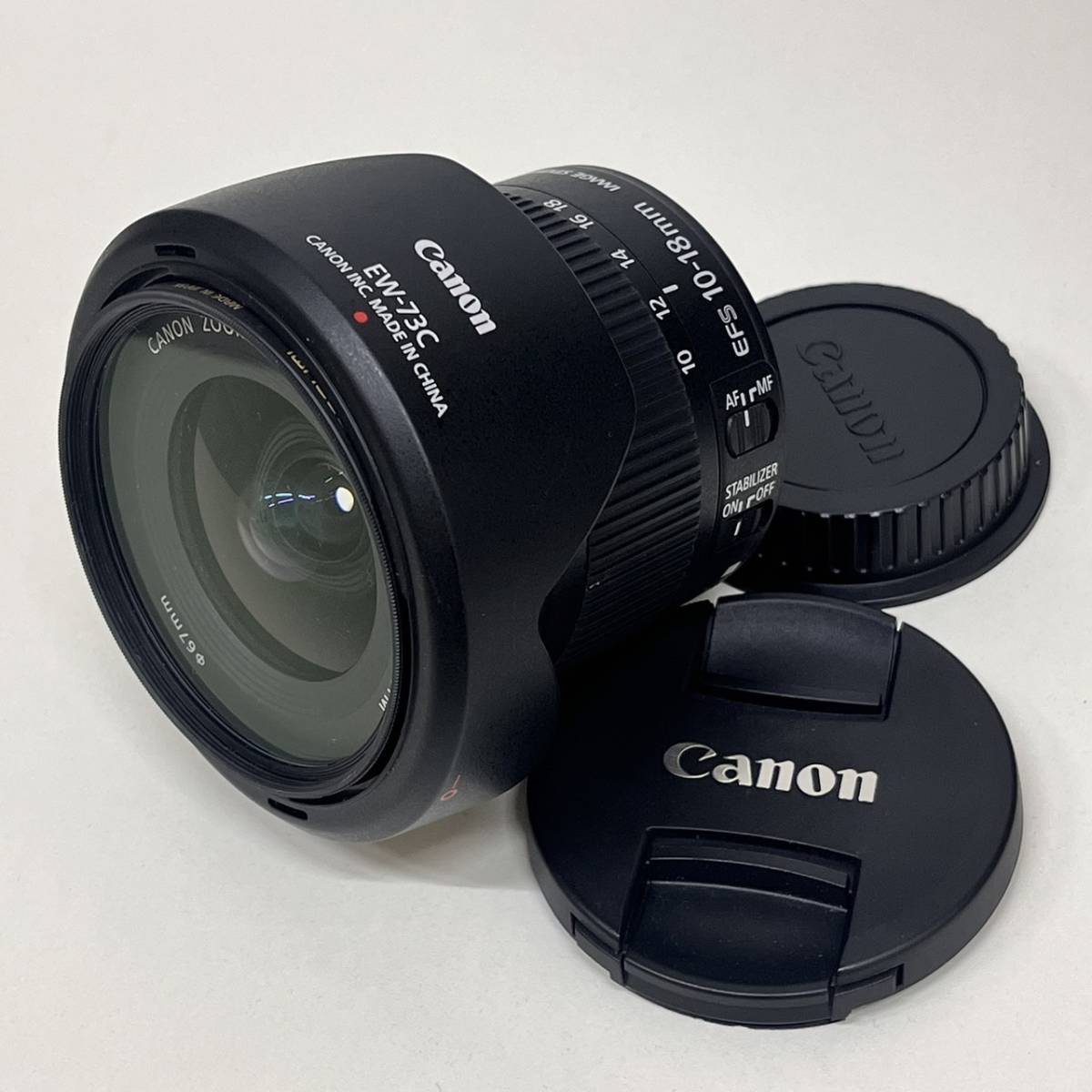 【C-22689】Canon EF-S 10-18ｍｍ F4.5-5.6 IS STM キャノン キャップ前後 EW-73C カバー付 中古_画像1