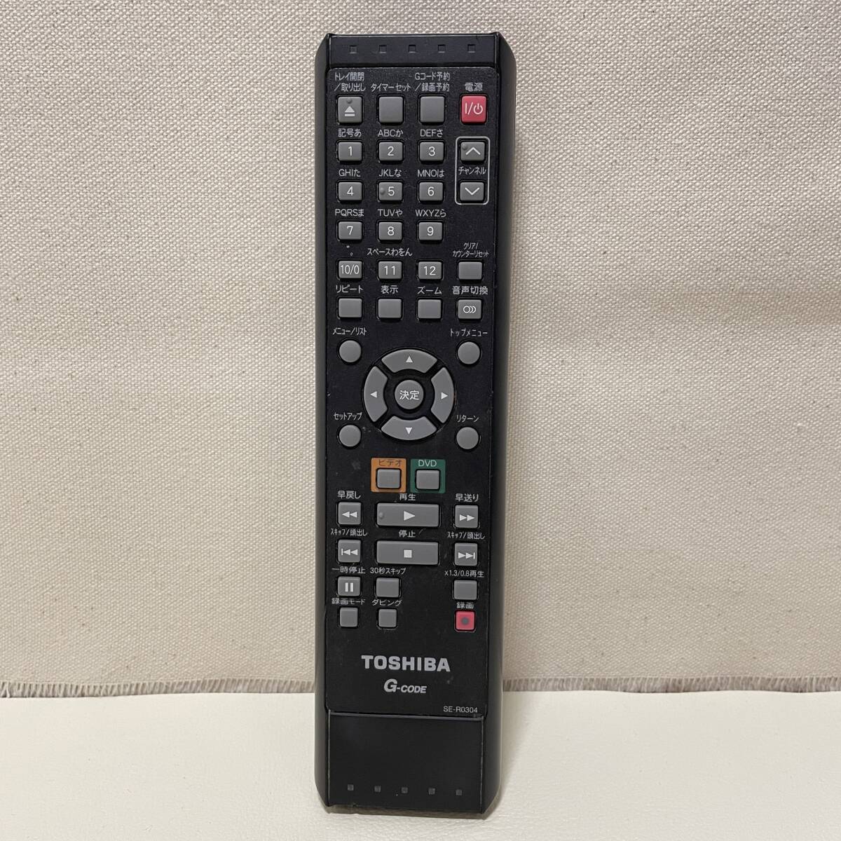 BB221【リモコン216】　動作確認済・保証付　東芝 TOSHIBA VHS VTR一体型DVDレコーダー D-VR7 リモコン SE-R0304_画像1