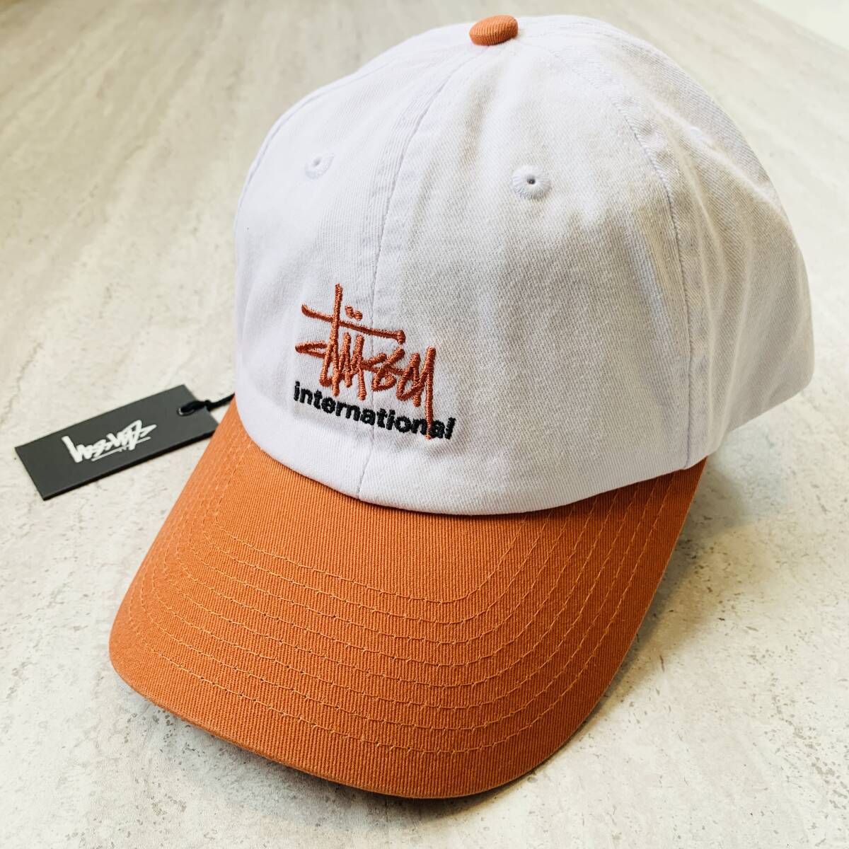  abroad limitation STUSSY Stussy snap back orange two-tone cap 