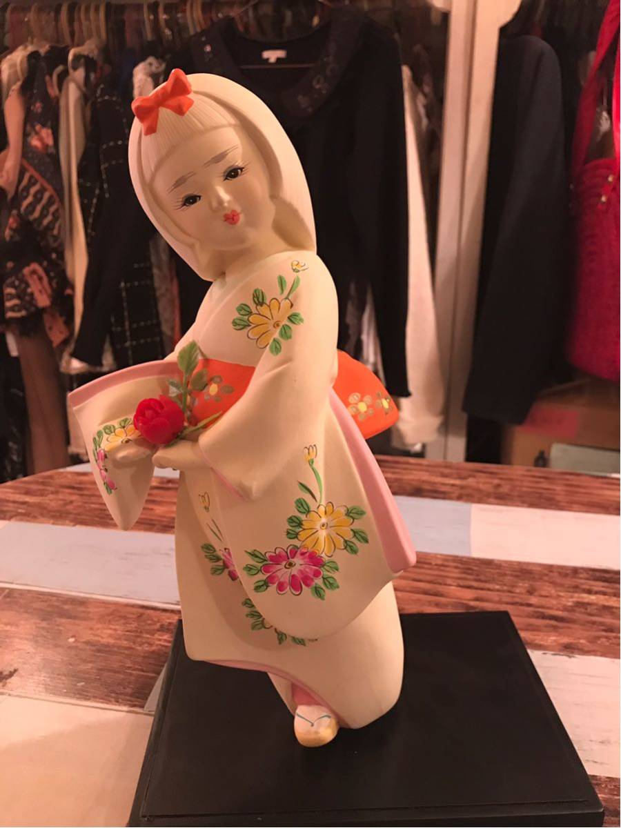  Hakata doll . flower . has girl 