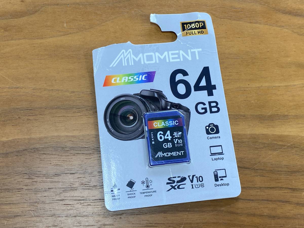 【1円オークション】MMOMENT SDカード 64GBMMOMENT SDカード 64GB メモリーカード フルHD動画撮影/デジタルカメラ/一眼レフ TS01B000493_画像1