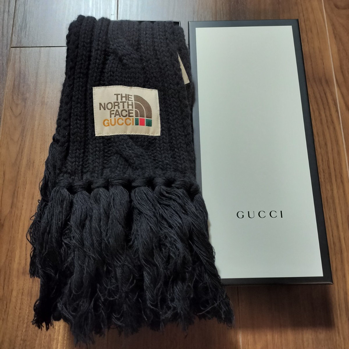 グッチ（GUCCI）× THE NORTH FACE(ザノースフェイス)黒マフラー、数量限定コラボ商品新品　未使用　箱付き_画像1