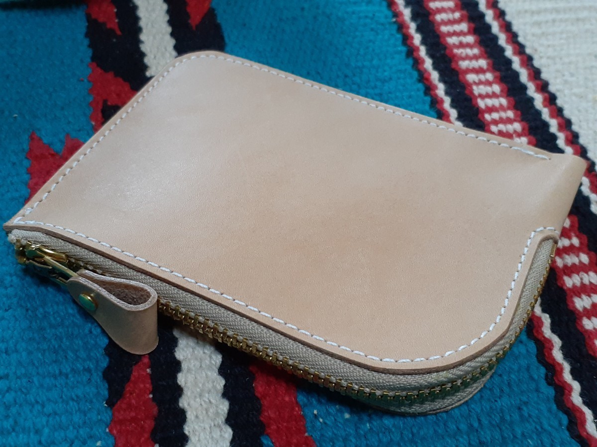  coins . enough go in . cow leather L fastener coin case 