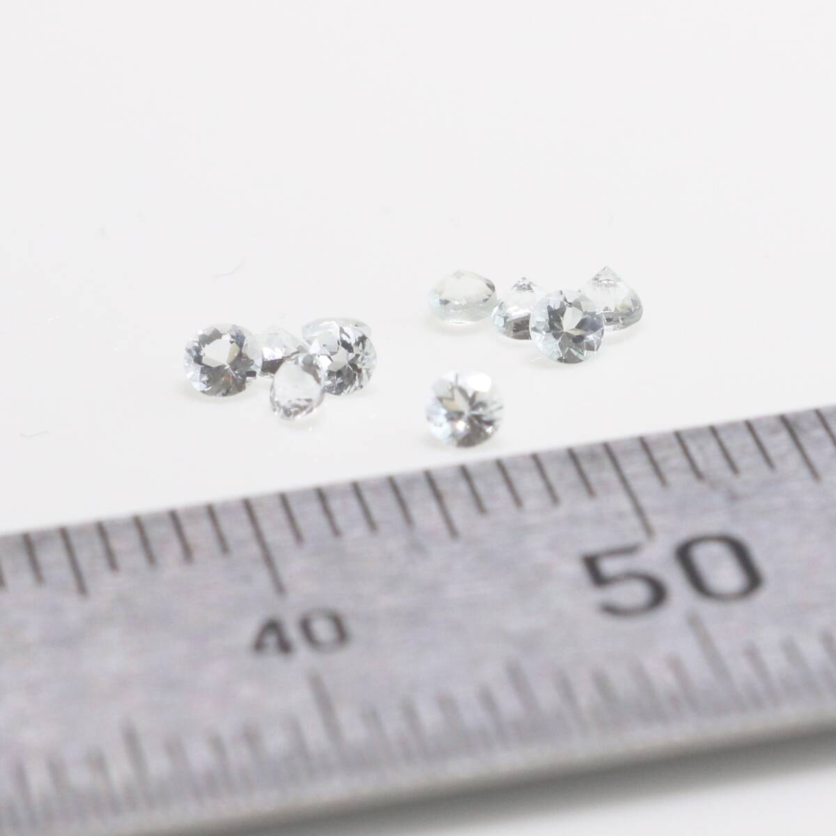  чистый аквамарин 2mm раунд. Rod 10ke.0.34ct