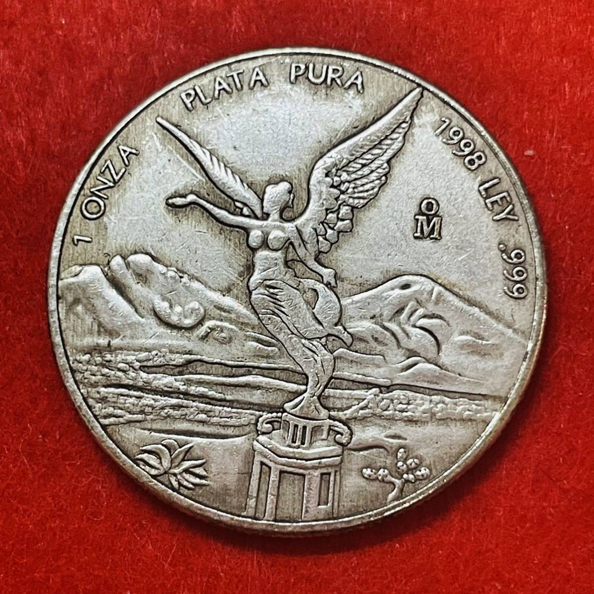 メキシコ 硬貨 古銭 1998年 翼のある女神 「メキシコ合衆国」銘 ポポカテペトル火山 イスタクシウアトル火山 記念幣 コイン 重さ26.53g_画像1