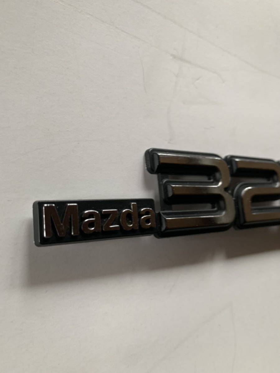  Mazda 323 emblem that time thing Familia 