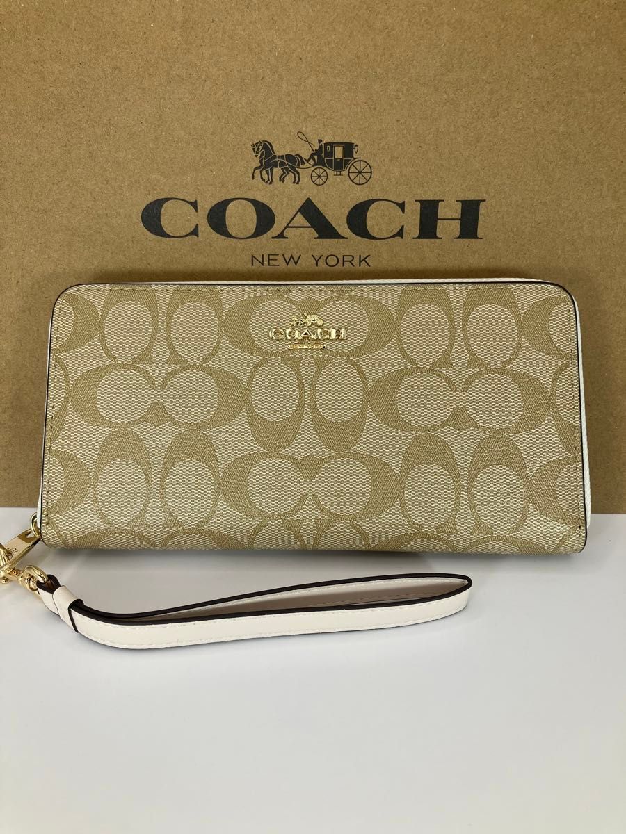 新品未使用　coachコーチ ベージュシグネチャー長財布