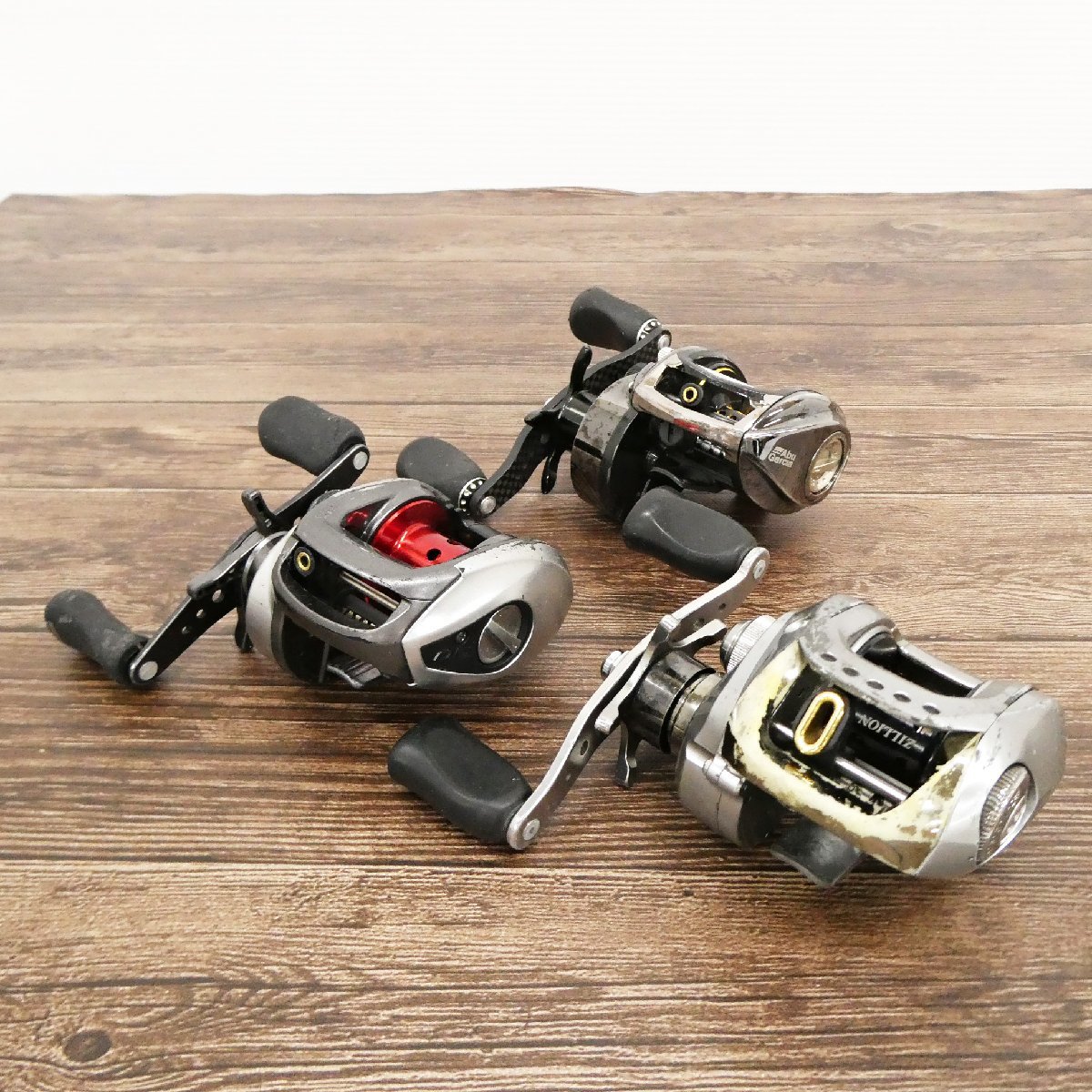 ○D) 3点セット!ベイトリール/SHIMANO Scorpion DC 7/Daiwa 100P CRAZY CRANKER/Abu　REVO BIGSHOOTER COMPACT REV03 BC【難あり】_画像1