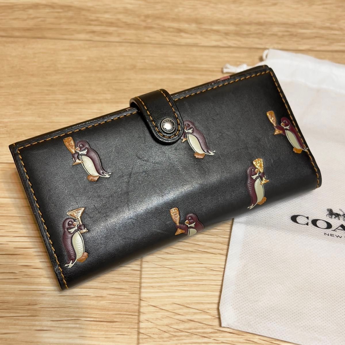 【COACH】コーチ グラブタンレザー ペンギン プリント 三つ折り 長財布