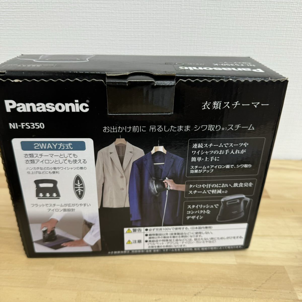 Panasonic Panasonic NI-FS350-K одежда отпариватель черный пар 