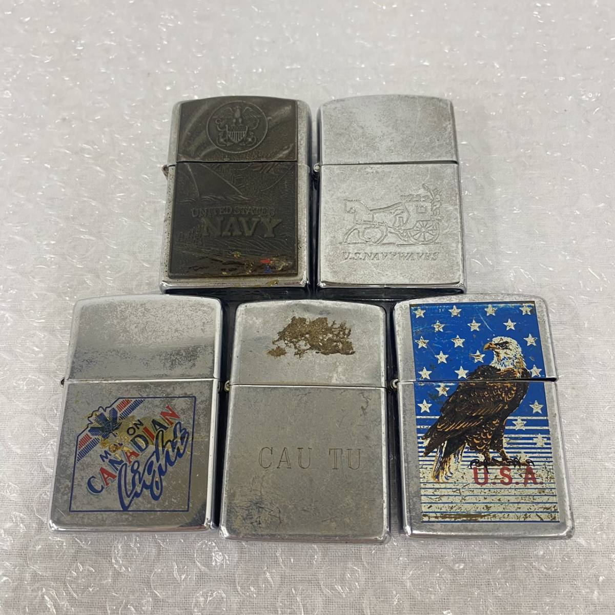 PA021305(031)-405/IS3000【名古屋】ライター Zippo ジッポ 5点まとめ U.S.A / CAU TU / MOLSON CANADIAN Light / U.S.NAVYWAVBS 他_画像1